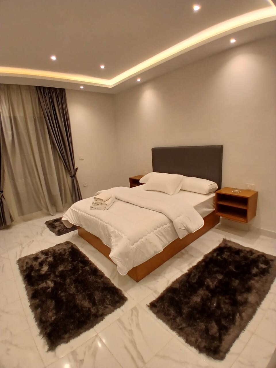 Master bedroom — vanity and mirrored wardrobe